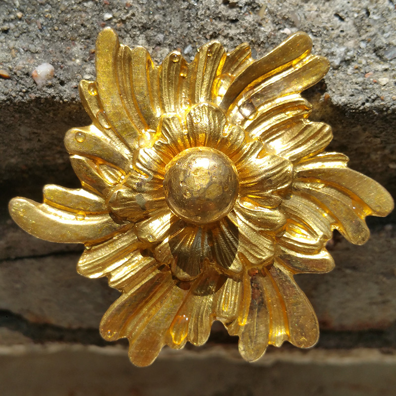 Exemple d'un nettoyage d'un bronze dorée au mercure